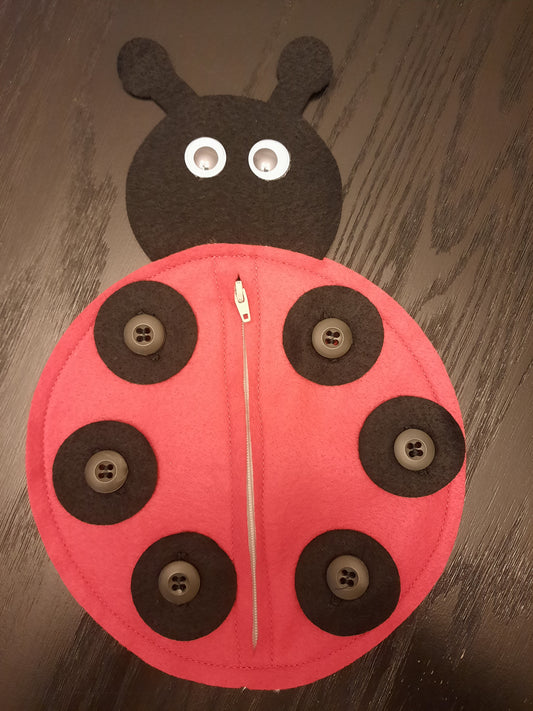 125- Zipper and Button Ladybug